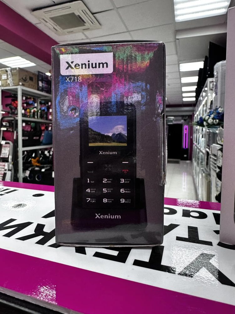 Мобильный телефон Philips x718